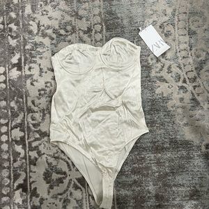 White Zara bodysuit. Size small and medium. New with tags!